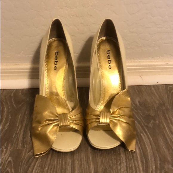 bebe Shoes - Bebe cream and gold bow accent heels
